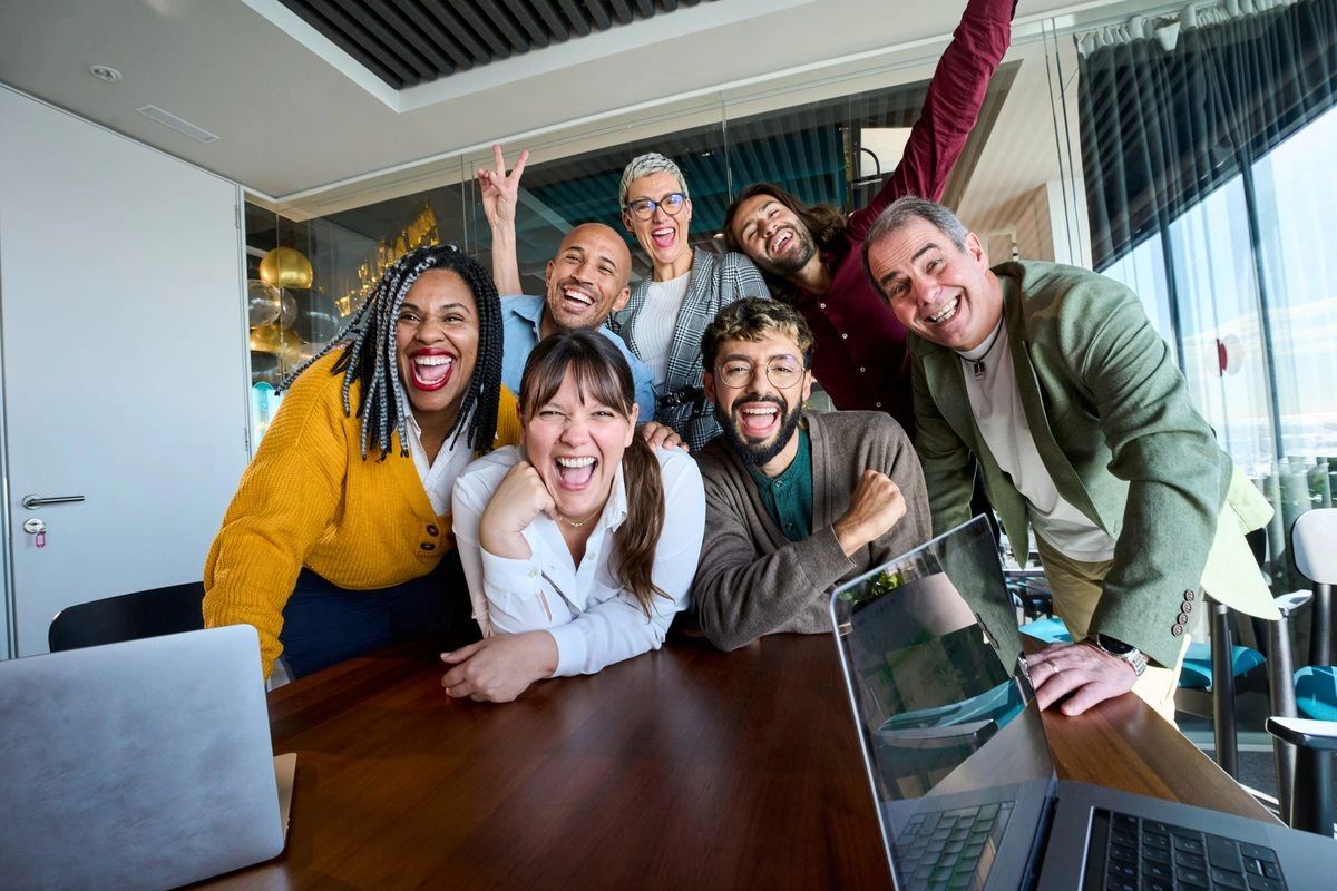 A group of colleagues celebrating together
